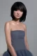 Mujer con corte shag midi en cabello negro, creación destacada de la colección Iconic por Sassoon Academy.