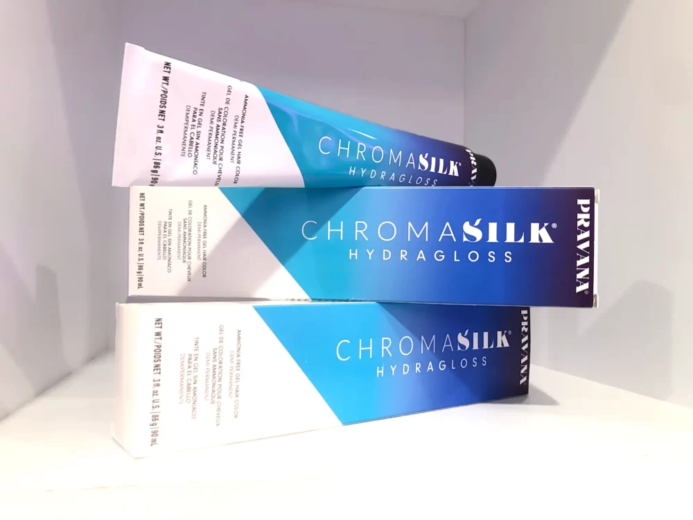 Detalle del producto PRAVANA Chromasilk Hydragloss rubios tono 10P en exhibición de lanzamiento en México.