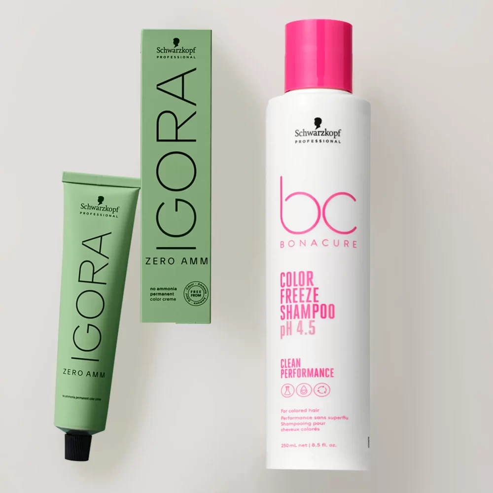 Tubo y caja de tinte Igora Zero AMM junto al shampoo Bonacure Color Freeze pH 4.5 de Schwarzkopf Professional sobre fondo neutro.