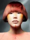 Cabello corto rojo con flequillo recto en la colección Spectra de Gary Hooker & Michael Young