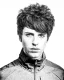 Retrato de la colección Real People de Craig Mason con cabello masculino voluminoso, flequillo lateral y textura suave.